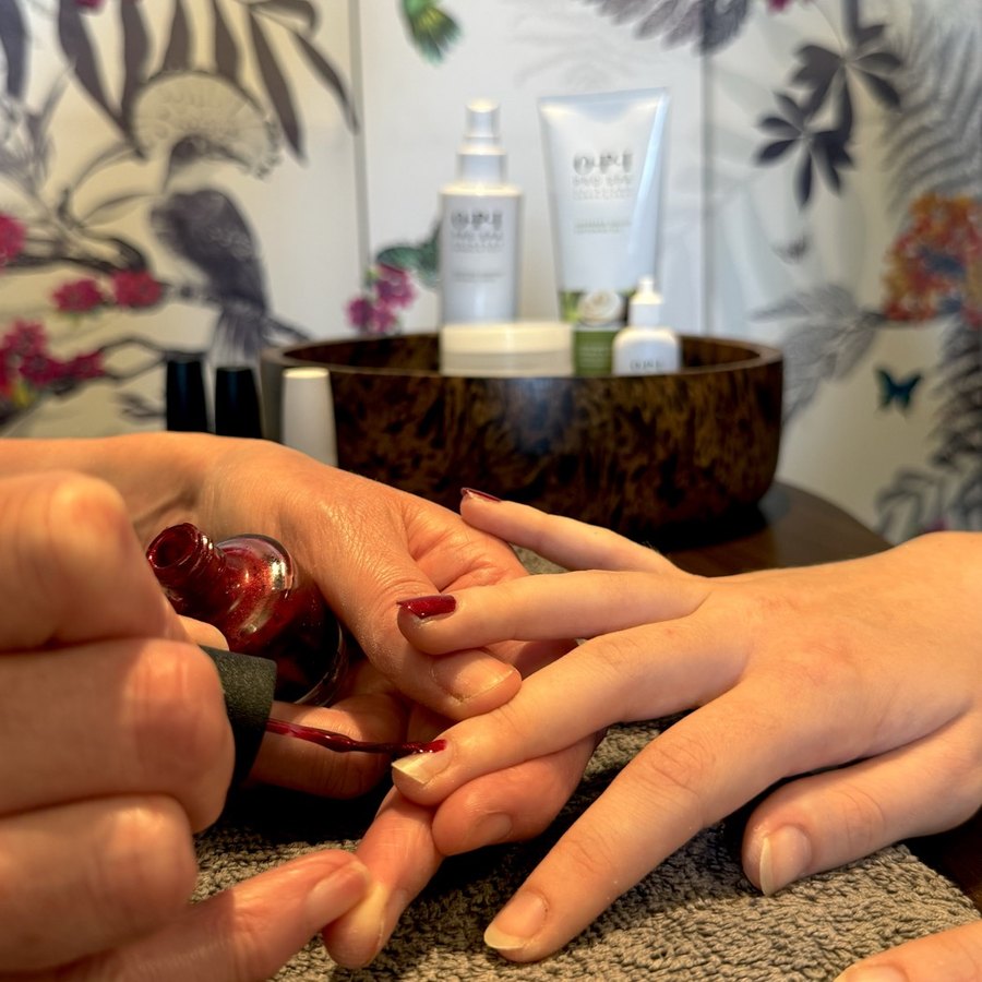 Manicure in progress at the nail bar
